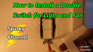double switch for a bath light and fan