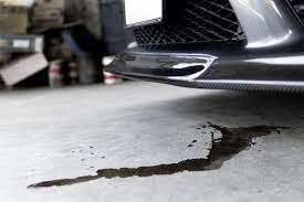 car leaking oil when parked and running