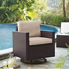 sand and brown wicker patio swivel