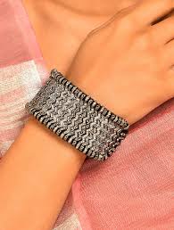 silver adjule cuff with diamonds