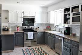 Fabulous kitchen features white apron sink accented with gooseneck faucet as well as hidden dishwasher disguised behind cabinet door. Remodelaholic Grey And White Kitchen Cabinet Ideas