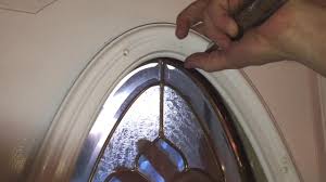 oval glass in an entry door