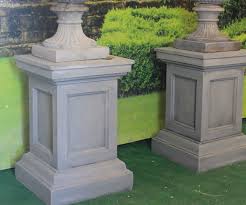 single georgian urn on panel plinth