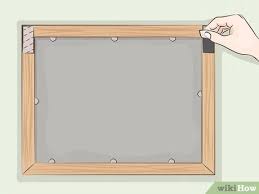 The simplest way to hang pictures on the wall is to hammer a nail into the wall. 3 Ways To Hang Stuff On Walls Without Leaving Marks Wikihow