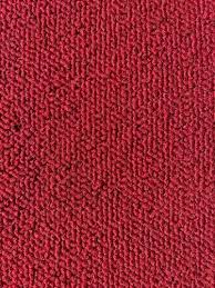 red wall to wall loop pile carpet