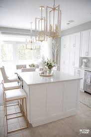 A fresh, bright white look gives your kitchen a modern and friendly feel, making it the perfect gathering spot for friends and family. Our Dark To White Kitchen Remodel Before And After Setting For Four