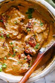 smothered pork chops recipe thood