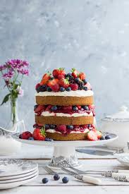 vegan vanilla cake with berries and jam