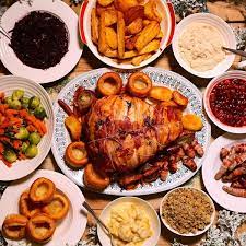 A traditional english and british christmas dinner includes roast turkey or goose, brussels sprouts, roast potatoes, cranberry sauce, rich nutty stuffing, tiny sausages wrapped in bacon (pigs in a blanket) and lashings of hot gravy. The Cost Of Christmas Dinner Past And Present Mirror Online