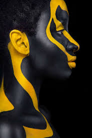 face art woman with black and yellow