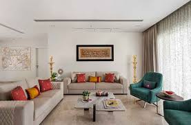 This living room is the definition of class and elegance. This Mumbai Apartment Will Woo You With Its Southern Charm Indian Living Rooms Interior Design Living Room Apartment Interior Design
