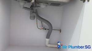 repair kitchen sink drain pipe plumber