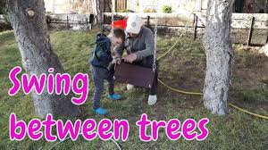 To hand a swing in a tree you will need a branch that is more or less parallel to the ground. How To Make A Swing Between Two Trees Youtube