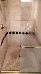 marble shower with soap s and