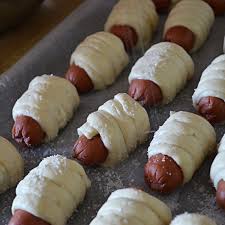 Return to the prepared cookie sheet, brush the top of each pretzel with the beaten egg yolk and water mixture and sprinkle with the pretzel salt. Mini Pretzel Dogs Host The Toast