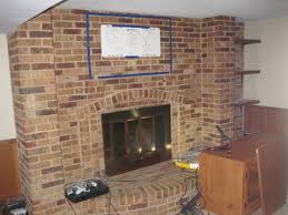 mount a tv above a brick fireplace