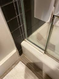 how to remove glass shower panel from u