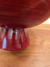 large red wood bamboo swirl footed bowl