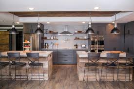 The white walls look so crisp against the contrasting grey trim and doors. The Most Memorable Kitchens By Chip And Joanna Gaines