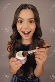 Child Girl 12, 13, 14 Years Old Making Beauty Make Up With Powder And  Brush. Beautiful Teenager Applying Makeup. Happy Girl Face, Positive And  Smiling Emotions. Stock Photo, Picture and Royalty Free Image. Image  194690687.