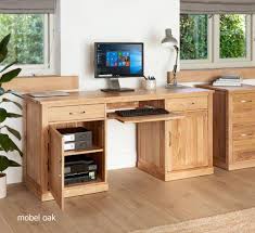 Office desks are a large part of our business. Mobel Oak Large Hidden Office Twin Pedestal Computer Desk Baumhaus Mobel Oak Home Office Desk