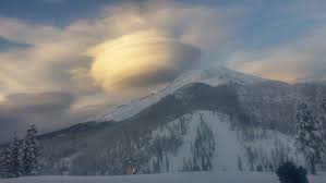Lenticular clouds swirl over Mt. Shasta