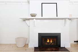Existing Fireplace With A Wood Fire Insert