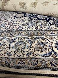 clean oriental carpets containing silk