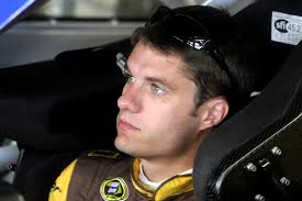 David Ragan, driver of the #6 UPS/Ned Jarrett NASCAR Hall of Fame Ford, sits in his car during practice for the NASCAR Sprint ... - David%2BRagan%2BIndianapolis%2BMotor%2BSpeedway%2BDay%2BH5jGuIxdkK5l