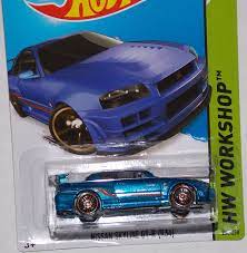 Amazon.com: 2014 Hot Wheels Nissan Skyline GT-R (R34) Blue 230/250 HW  WORKSHOP Then And Now : Toys & Games