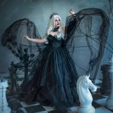 dark evil queen in a black fluffy dress