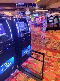 Plexiglass barriers and mandatory masks greet gamblers as casinos reopen