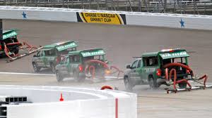 The air titan utilizes compressed air to push water off of the racing surface and onto the apron where vacuum trucks will remove any remaining moisture. Texas Motor Speedway To Repave Surface Add Drainage System