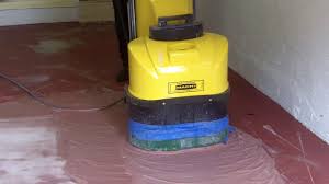 how to remove paint on a garage floor