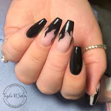 If you are one of those edgy girls and you love wearing dark colors and having your nails painted dark, or you just want a change in the color of your nails and want to switch it up a bit, then this is for you. Black Flame Nails Black Acrylic Nail Designs Acrylic Nails Coffin Short Acrylic Nail Designs Coffin