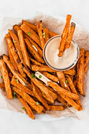 Sweet potato fries scream summer favorites including fried chicken, pulled pork, bbq pulled chicken, slow cooker ribs and all the best summer side dishes including macaroni salad, coleslaw and pasta salad. How To Make The Best Sweet Potato Fries With Aioli Damn Spicy