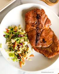 juicy baked pork steak the feathered