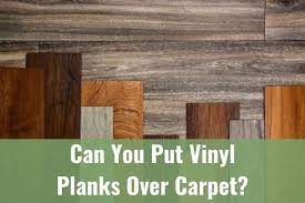 put vinyl planks over your carpet