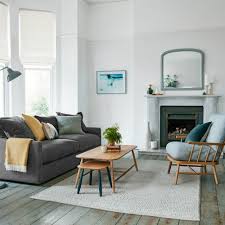 style a room when you have a grey sofa