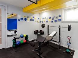 Sports theme, wall decor idea for home gym, design in black and white. Home Gym Decorating And Design Idea Pictures Hgtv