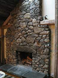Fieldstone Fireplace With Granite