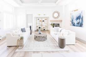 living rooms with white couches