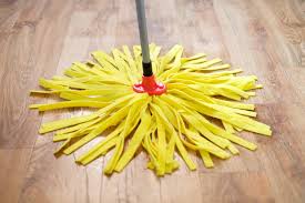how often to mop wood floors safely and