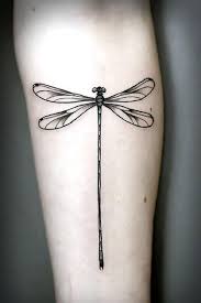 At tattoounlocked.com find thousands of tattoos categorized into helpful non helpful. Black Dragonfly Tattoo Idea