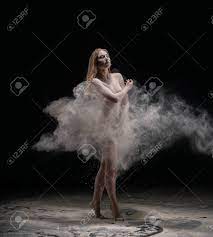 Barefoot Woman Dancing Nude In Cloud Of Dust Stock Photo, Picture And  Royalty Free Image. Image 152255241.
