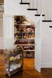 If i had unlimited funds and building skills, i'd put in permanent shelves that wrapped around the whole pantry. 3 Ideas To Steal From This Under The Stairs Pantry Pantries To Pin Kitchenideas Custom Kitchen Home Understairs Storage