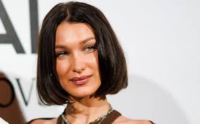 Using some texturizing spray to get the right look and hold for your waves. Bella Hadid Reveals Long Platinum Blonde Hair See Video Allure