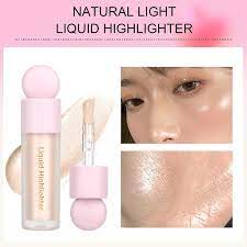 white liquid highlighter shimmer face