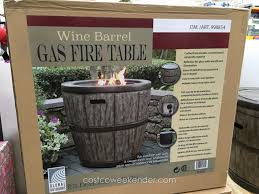 This decorative fire pit doubles as an attractive outdoor patio table. Global Outdoors Wine Barrel Gas Fire Table Gas Fire Table Fire Table Diy Gas Fire Pit