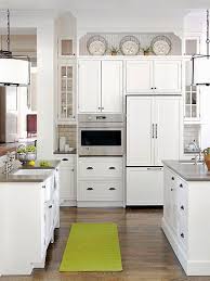 Finally, if white kitchen cabinets are in your plans, don't be afraid to add flourishes of color to the rest of your kitchen. 63 Decorating Above Kitchen Cabinets Ideas Above Kitchen Cabinets Above Cabinets Decorating Above Kitchen Cabinets